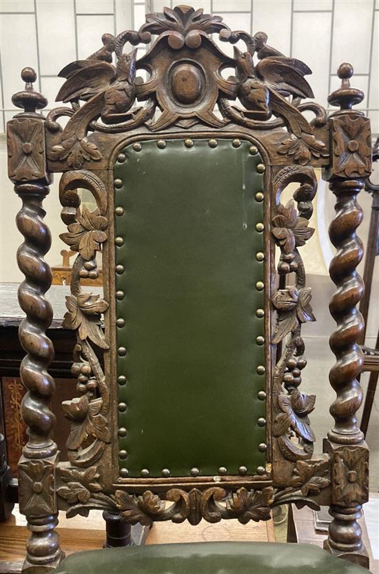 A pair of Victorian carved oak Carolean style side chairs